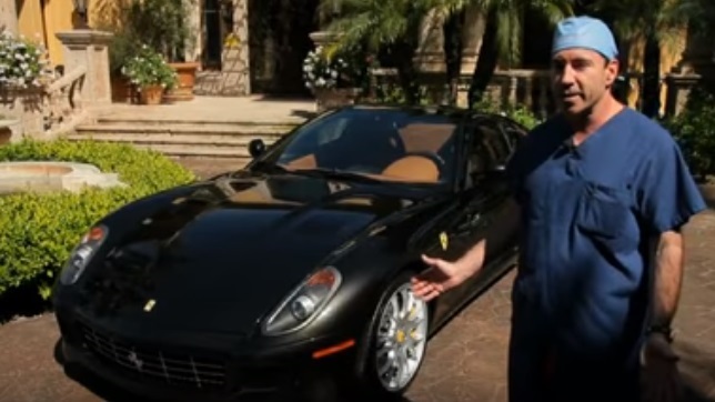 Picture of Garth Fisher along with his thousand dollar valued car